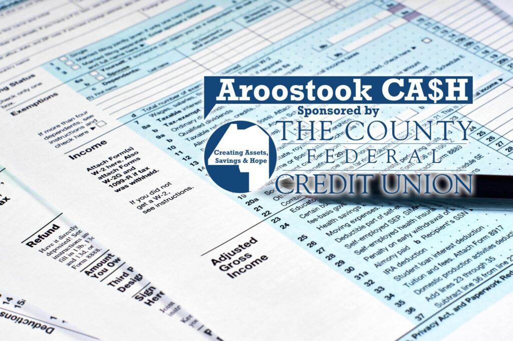 Tax reporting and pen. Filling out tax forms With Cash Coalition and CFCU logos