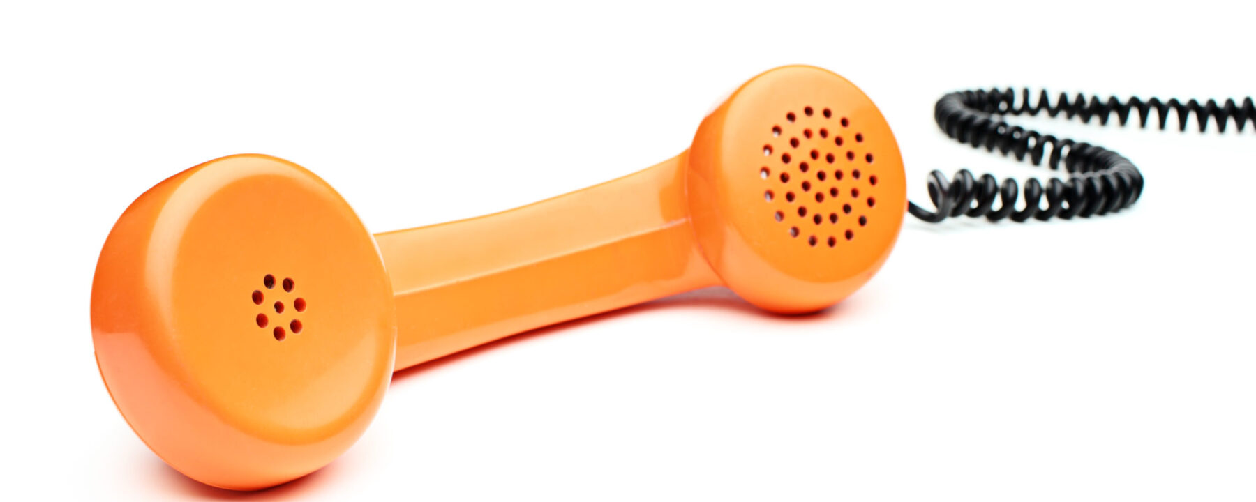 Orange phone receiver with cord